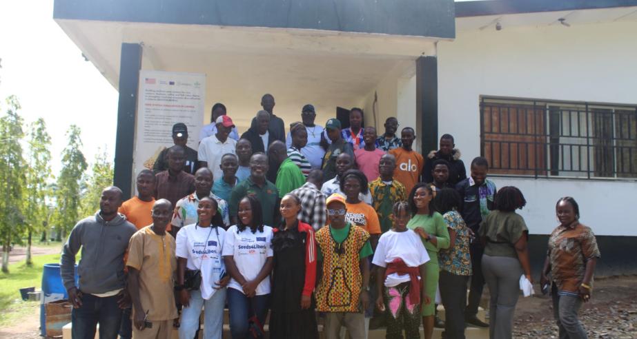 Participants from the cassava, wood, fisheries, and aquaculture sectors, along with youth and persons living with disabilities (PLWDs), pose with facilitators for a group photo during the aquaculture training workshop.