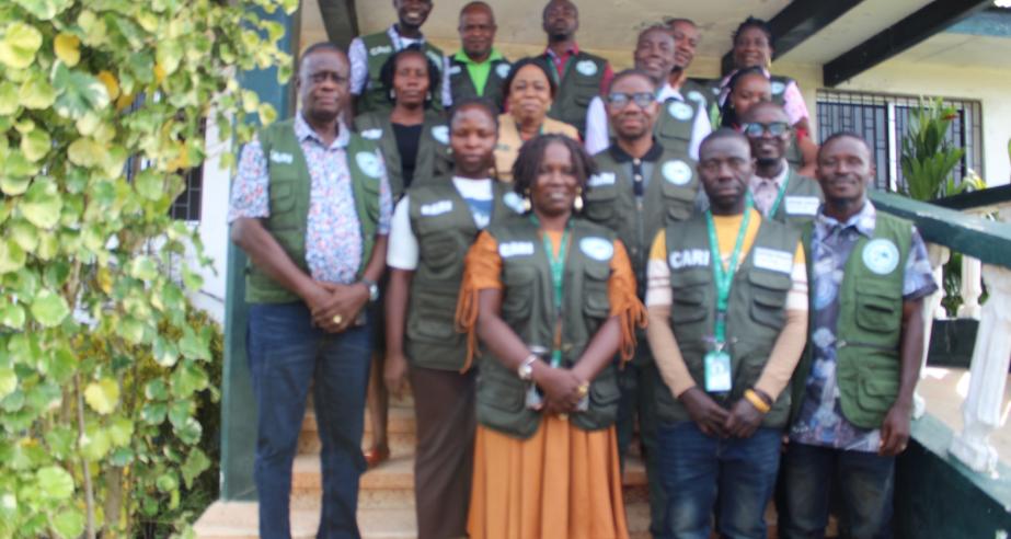 Dr. Arthur Bob Karnuah and Dr. James S. Dolo are flanked by research officers and research assistants ahead of departure for the survey, at CARI's Science Building in Suakoko