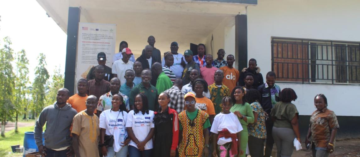 Participants from the cassava, wood, fisheries, and aquaculture sectors, along with youth and persons living with disabilities (PLWDs), pose with facilitators for a group photo during the aquaculture training workshop.